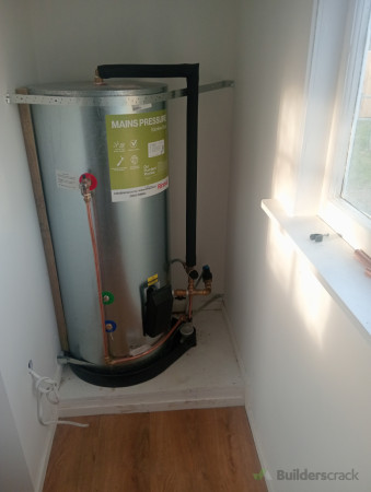 New hot water cylinder installation with copper pipework