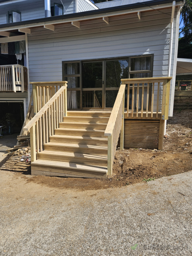Deck rebuilt with stairs down to driveway for access
