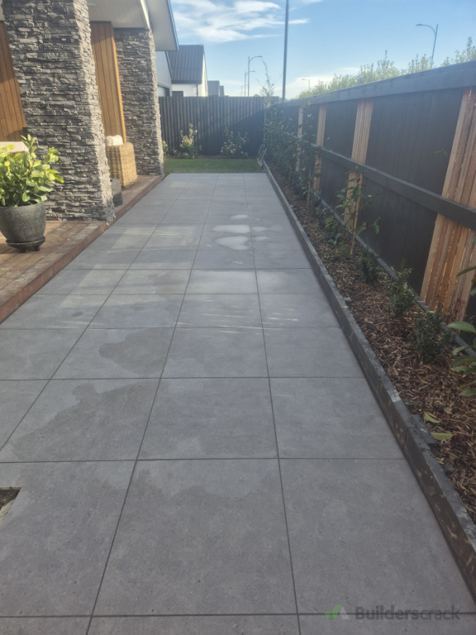 We did the dig out, prep work and laid these porcelain paver