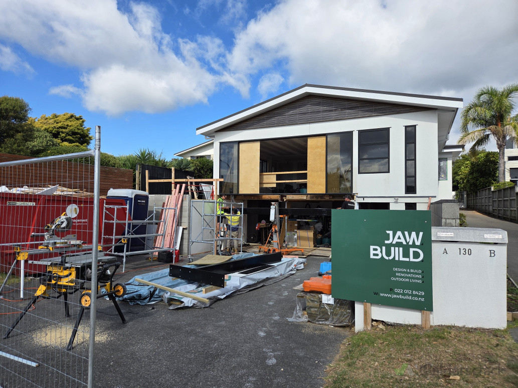Site in full swing, ready for new steel beam install to support deck