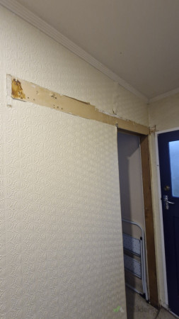 This was how the laundry entrance looked when I started ( original door had been removed)