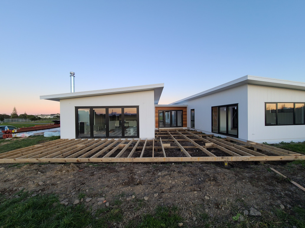 New architectural build with deck framing down