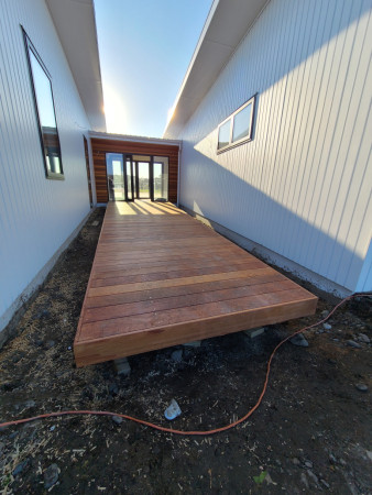 Entry with floating deck.