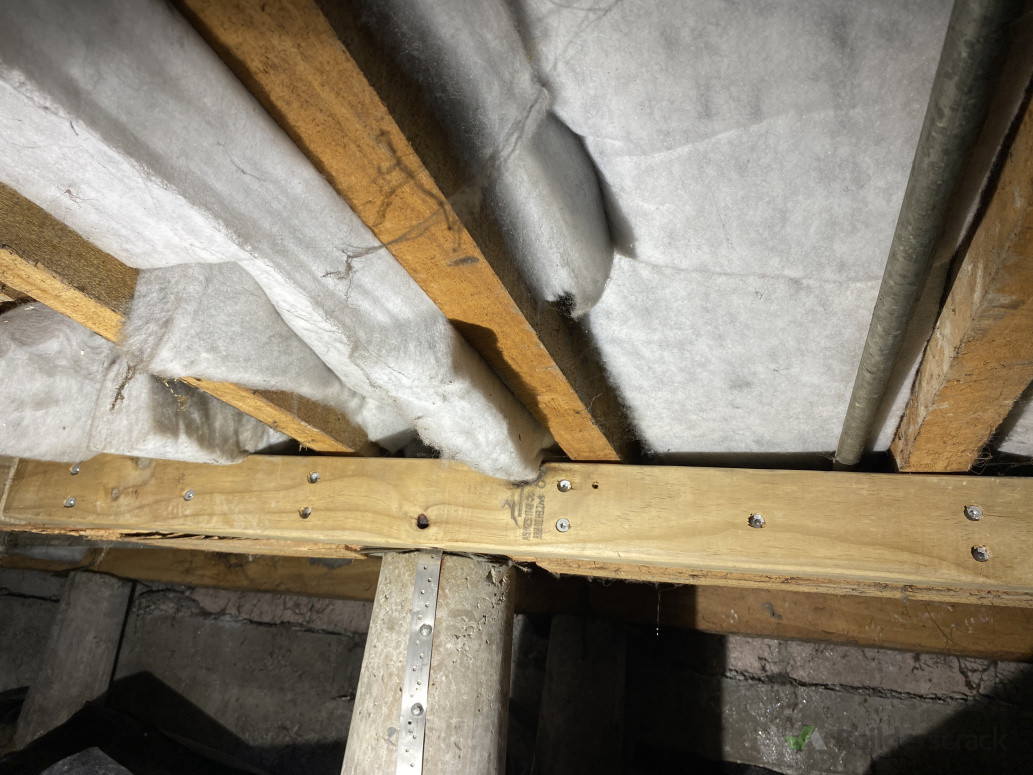 here showas a pile being packed strapped down with stainless steel straps and fleched.