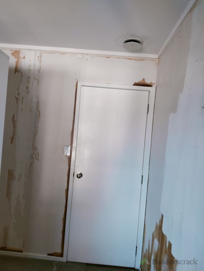 Before remaining wallpaper and plaster paint