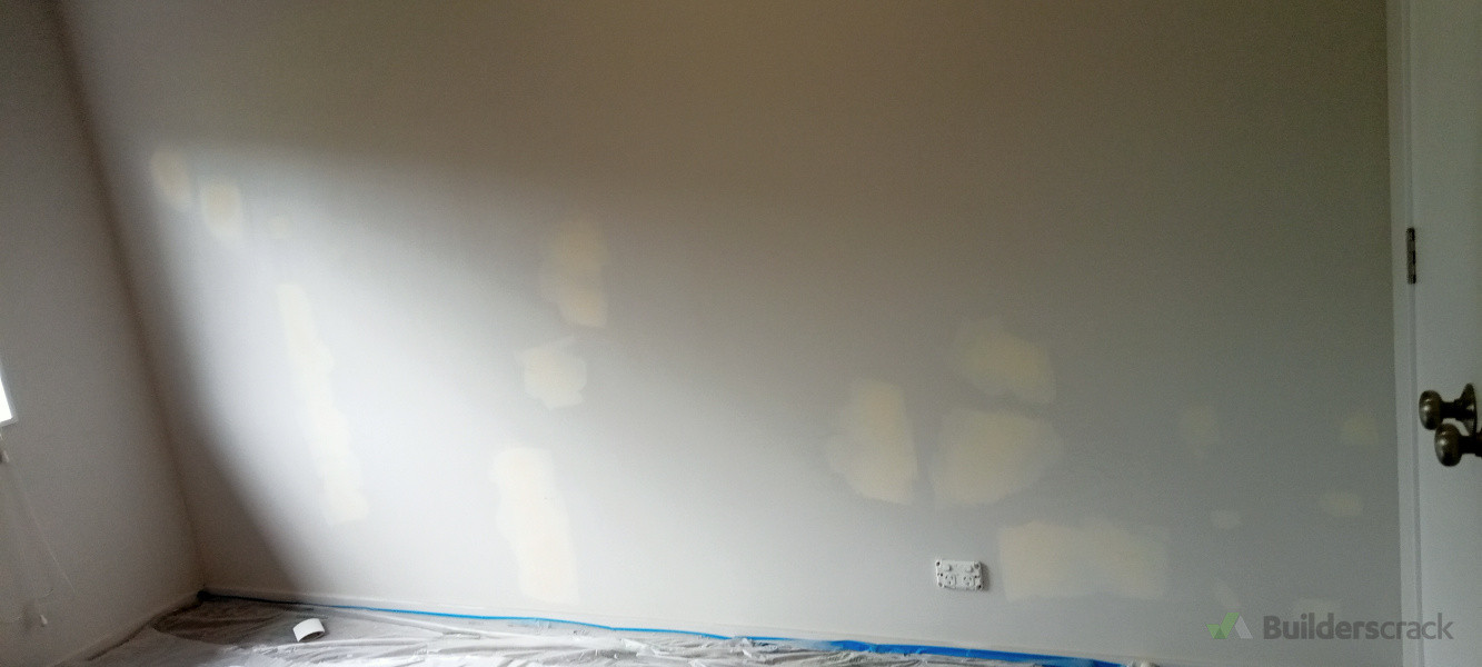 Wall prepping after wallpaper removal and prepping.