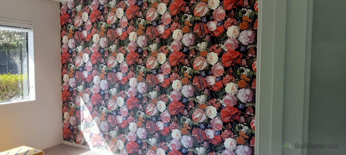 Initial wall before removal of wallpaper