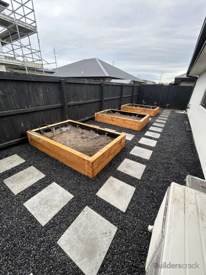 Raised garden beds, paving and chip