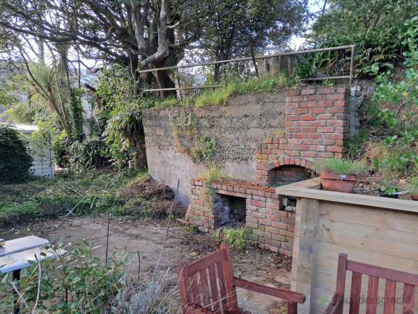 Original retaining wall after the site had been cleared