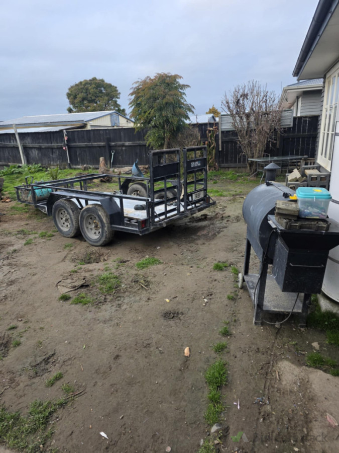 Concrete pad + drain (before)