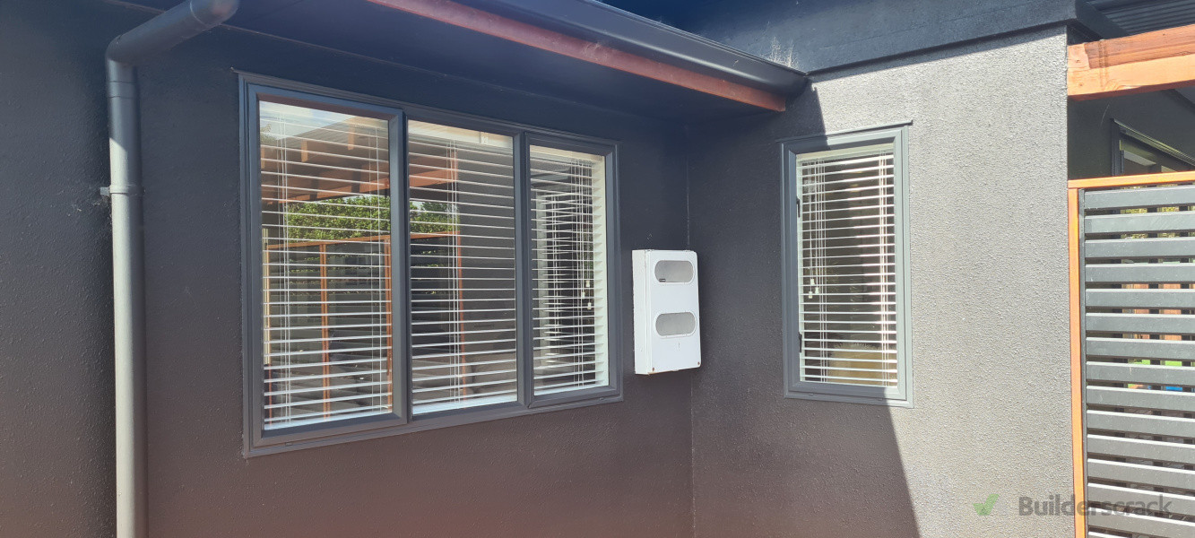 Exterior wall painted and barge board stained