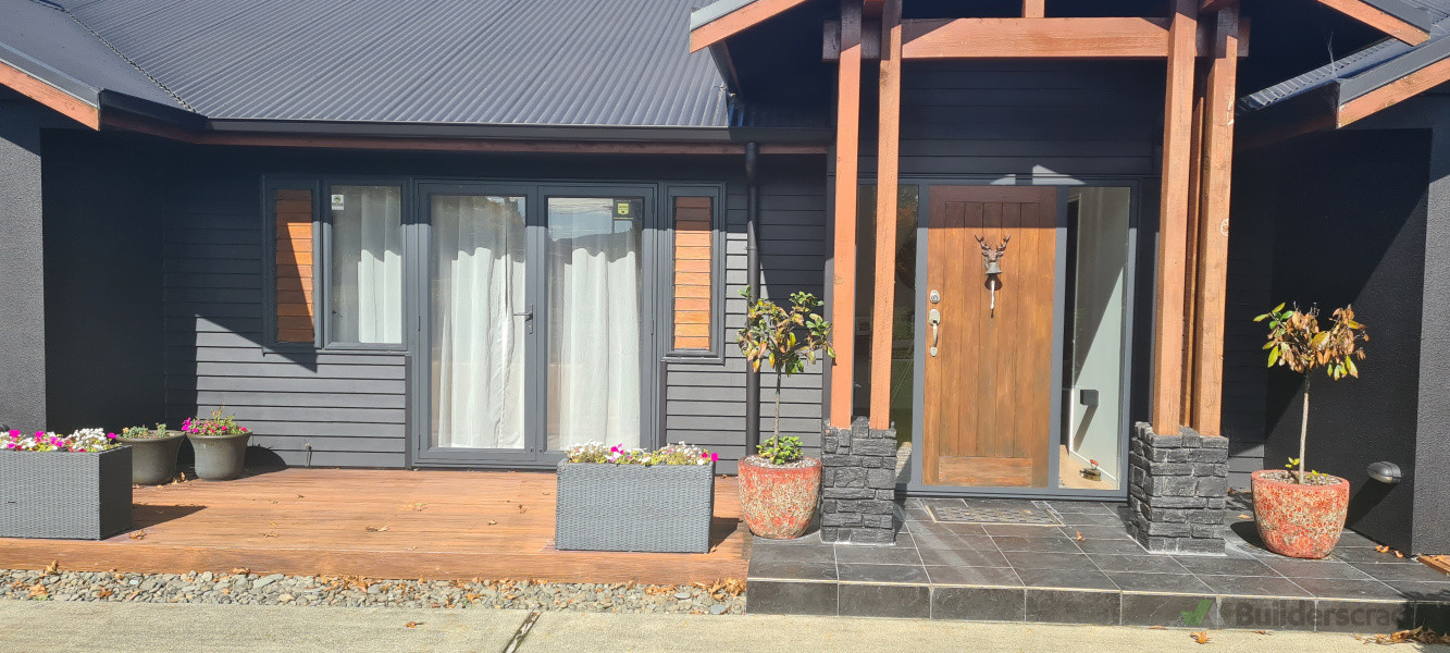 Exterior wall painted and barge board stained