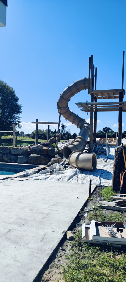 Slide and tower construction