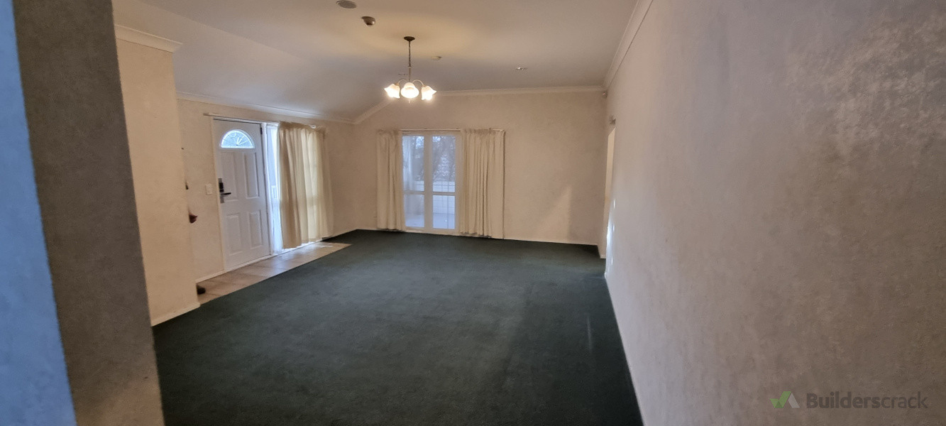 Carpet and wallpaper removed and surfaces prepped