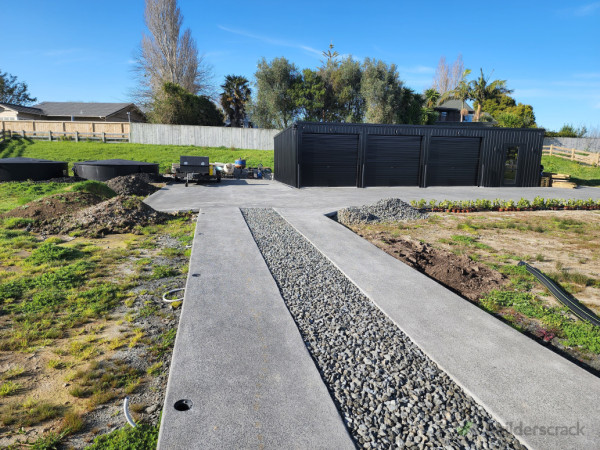 Lane driveway with drainage metal in center