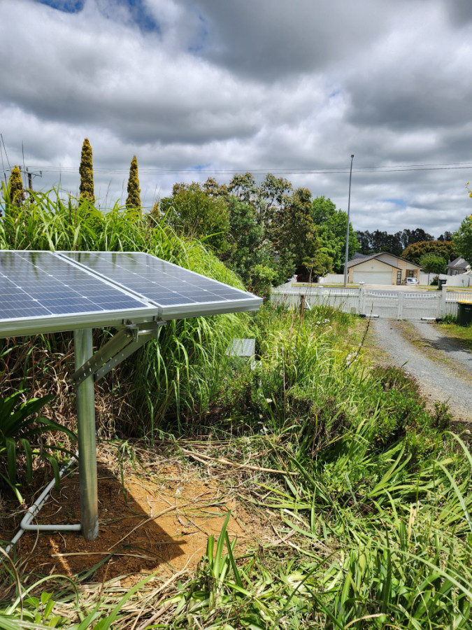 Custom solar-powered system and automated gate retrofit