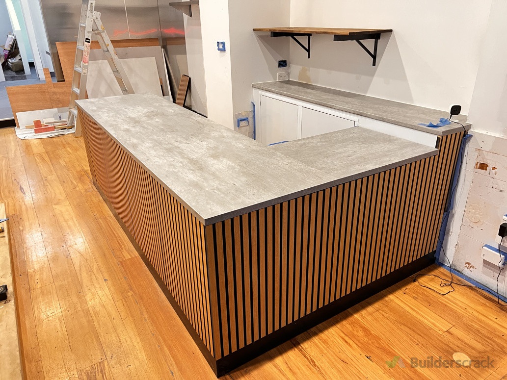 Decorative panels, custom-built islands and furniture, and wall panelling