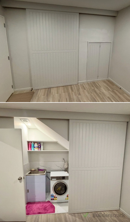 Under stairs storage created, shelving for laundry and barn door installed for tidy space creation