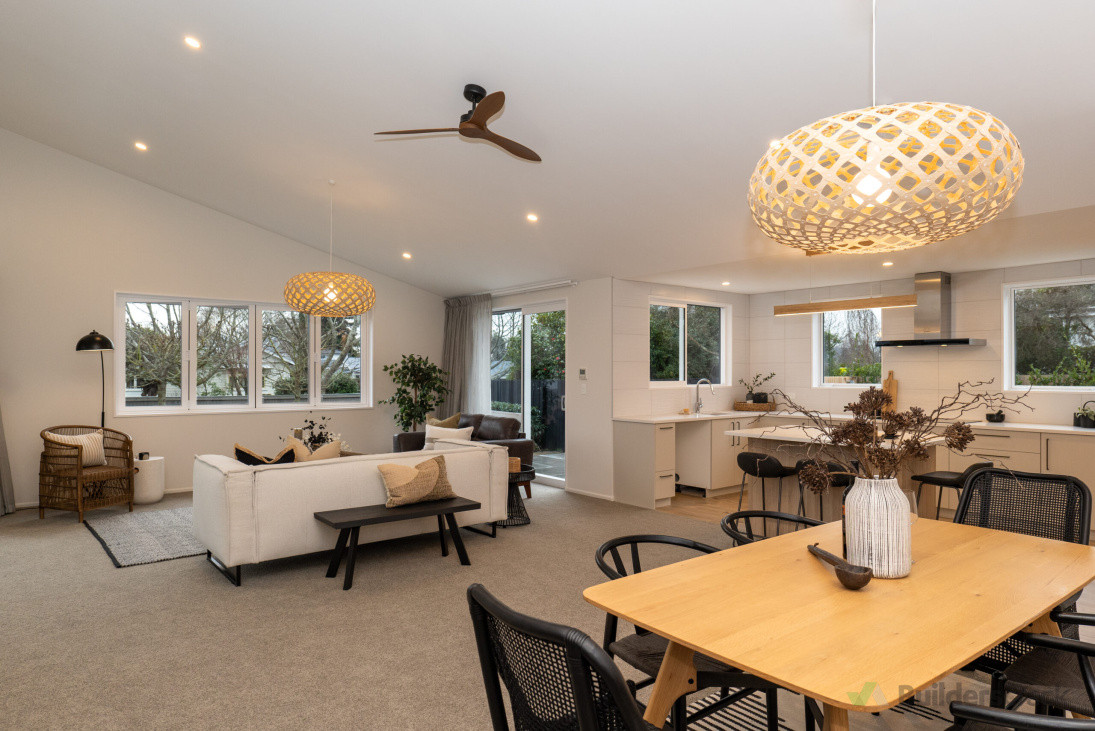 Raking ceiling to this kitchen, dining and living area