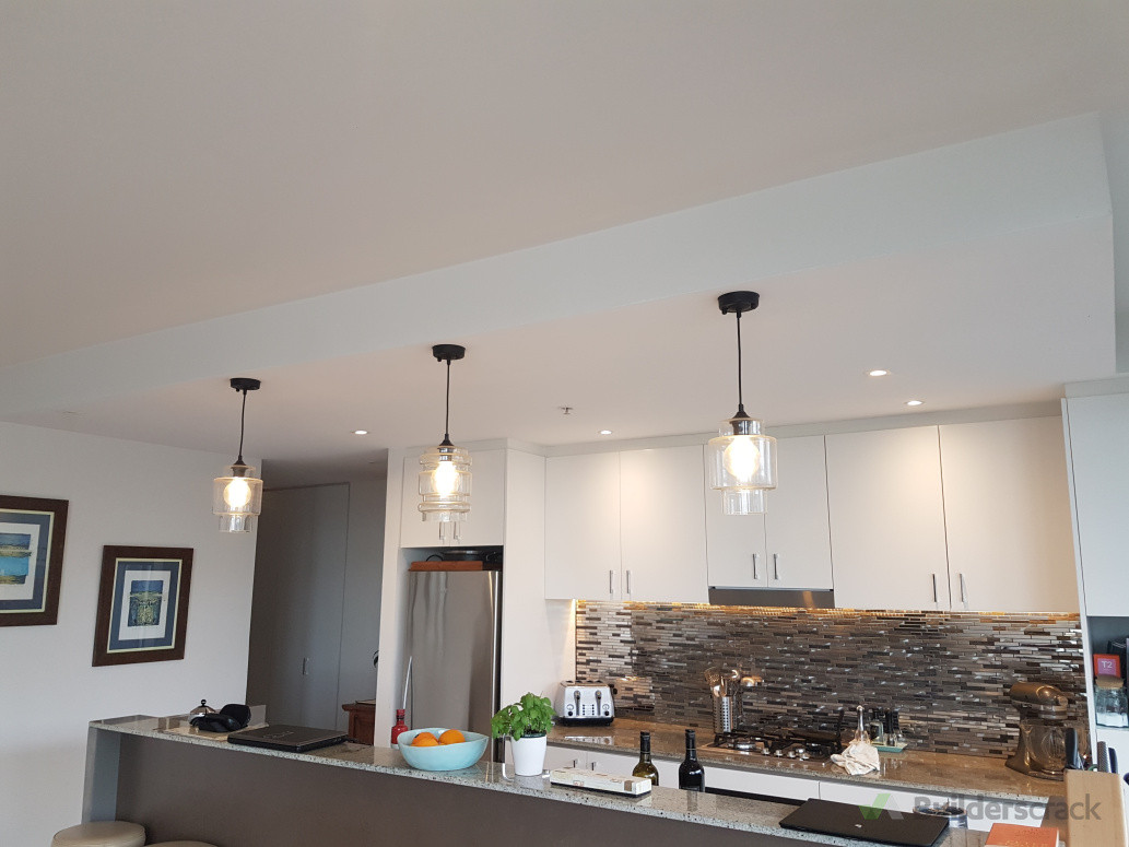 I installed the pendants, LED strip, Downlights, power points, and replaced the splash back tiles.