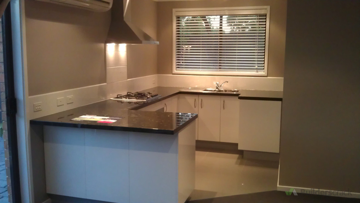 I installed this whole kitchen including: power and lighting, appliances, wall and floor tiles, painting, blinds, and cabinets.