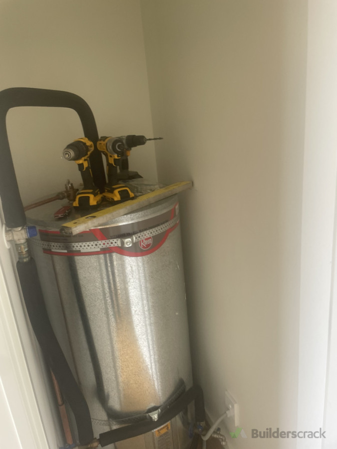 Before - Wasted space in heater closet