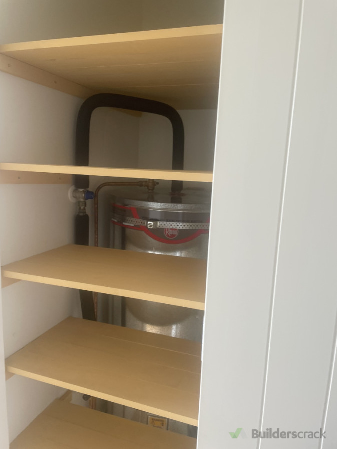 After - Heater closet space utilization