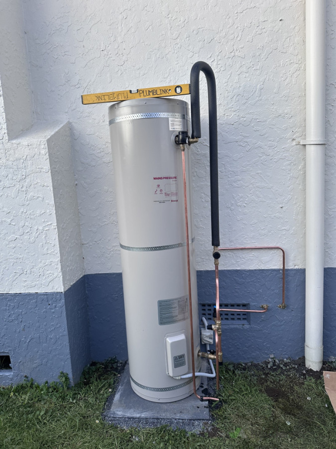 Another Rinnai install ✔️ Outdoors to save space inside, modern, efficient, and practical. A smart investment.