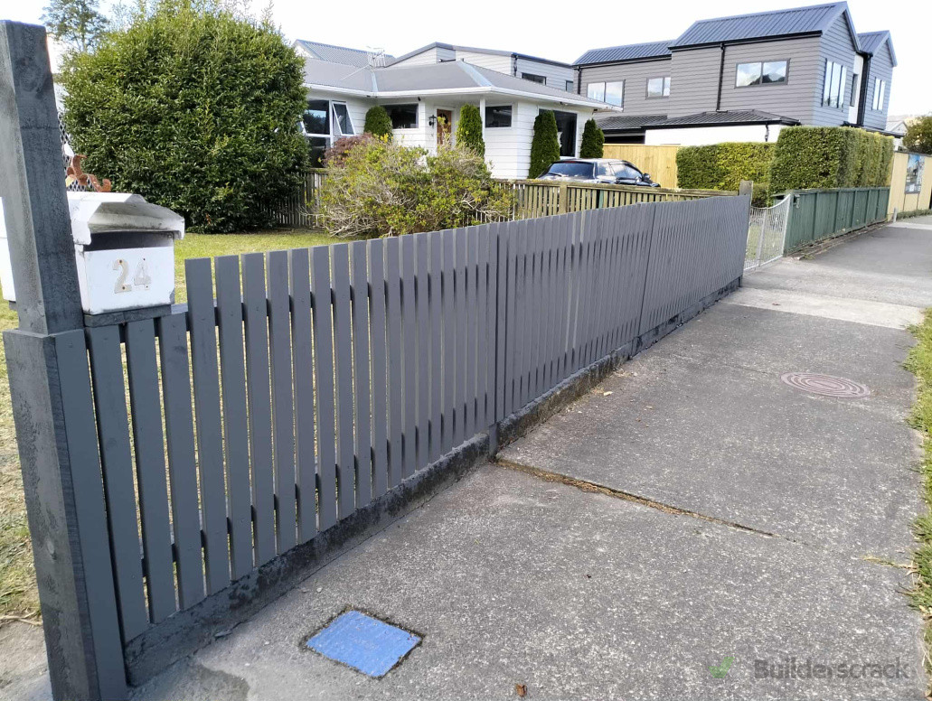 Replacement of rails and palings with fresh paint to restore front fence