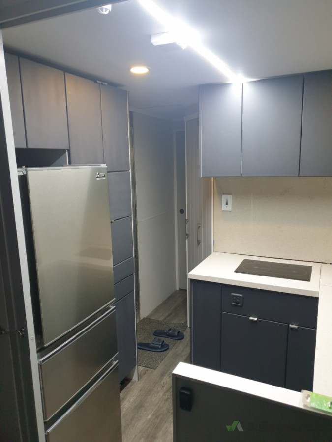 Custom designed and fabricated kitchen in a motorhome. The grey is only basecoat , was finished in a dark grey metallic