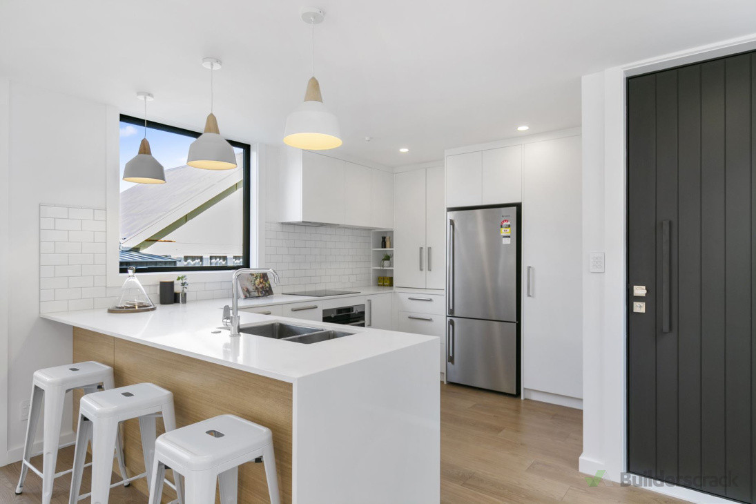 Create the perfect hub for family and friends with an open plan kitchen and stylish breakfast bar, combining modern design, functionality, and everyday comfort.