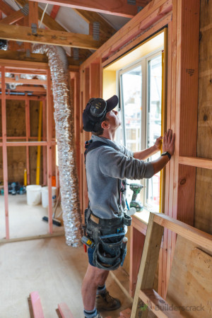 Thermal glazed joinery being installed