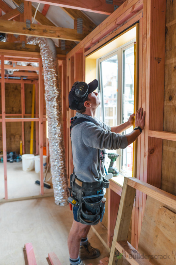 Thermal glazed joinery being installed
