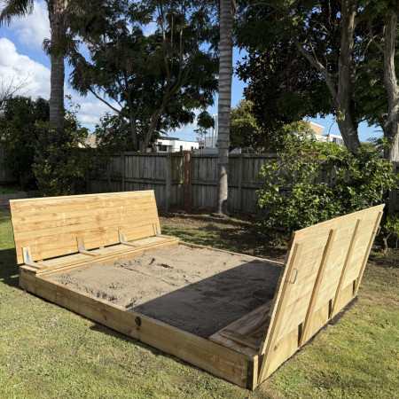 The sturdy treated wood construction, highlighting durability and weather resistance.