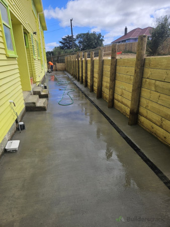 fresh concrete pours with new slot drains