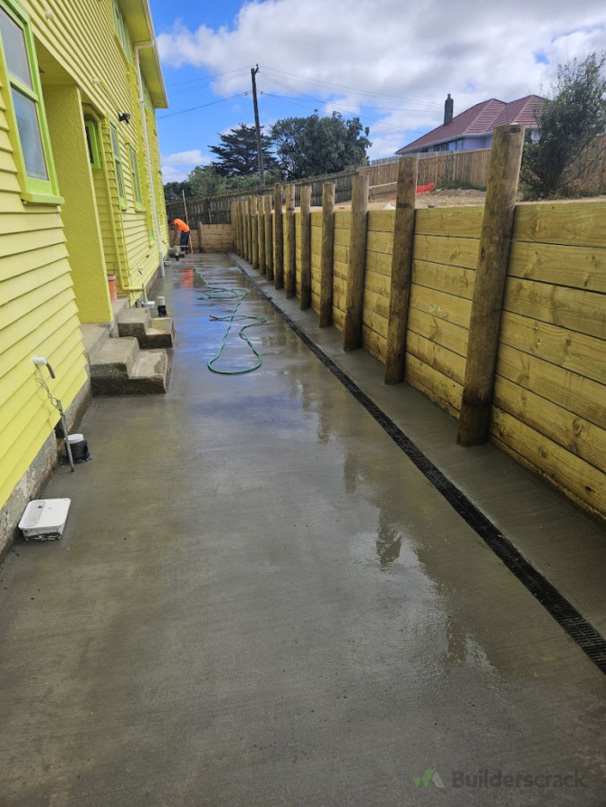 fresh concrete pours with new slot drains