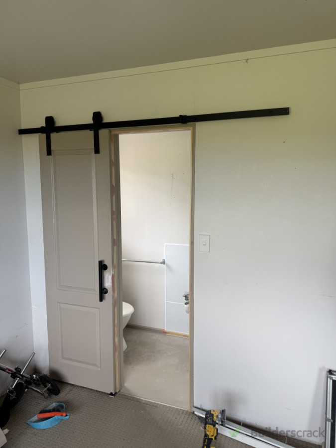 Turned a swinging fit into barn door style