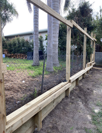 Small retaining wall and 1.8 fence on top