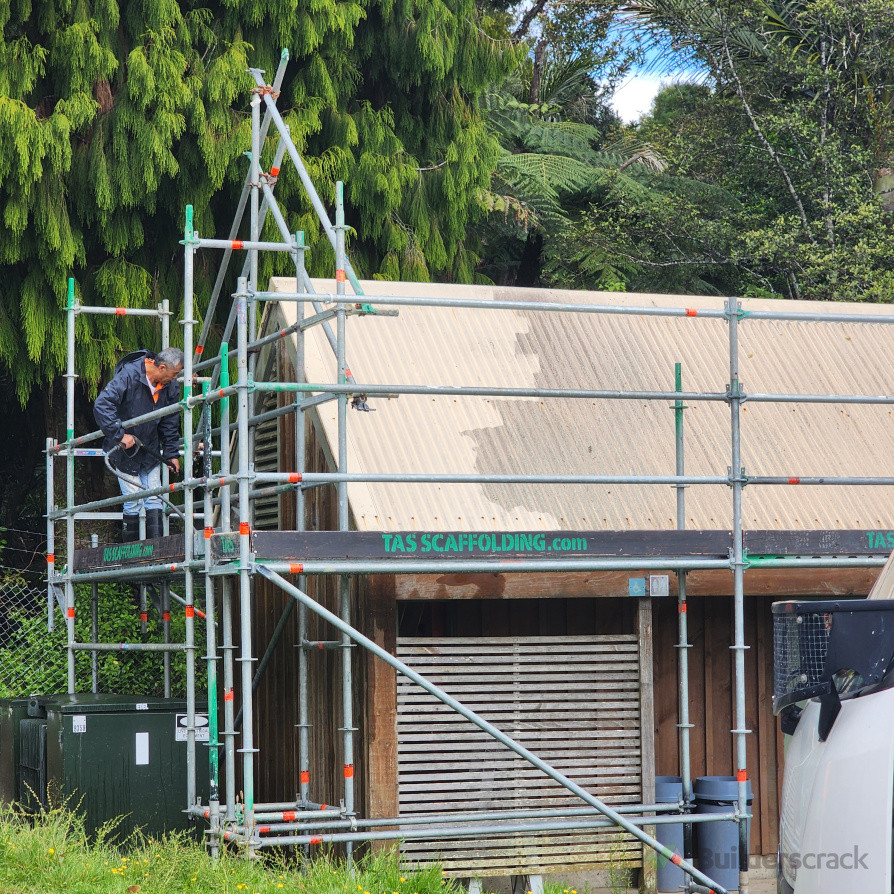 Scaffolding was erected to facilitate exterior cleaning and painting works, including water blasting and repainting of walls and roof.