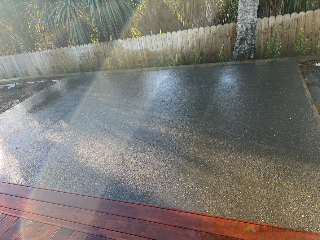Exposed pebble bbq area