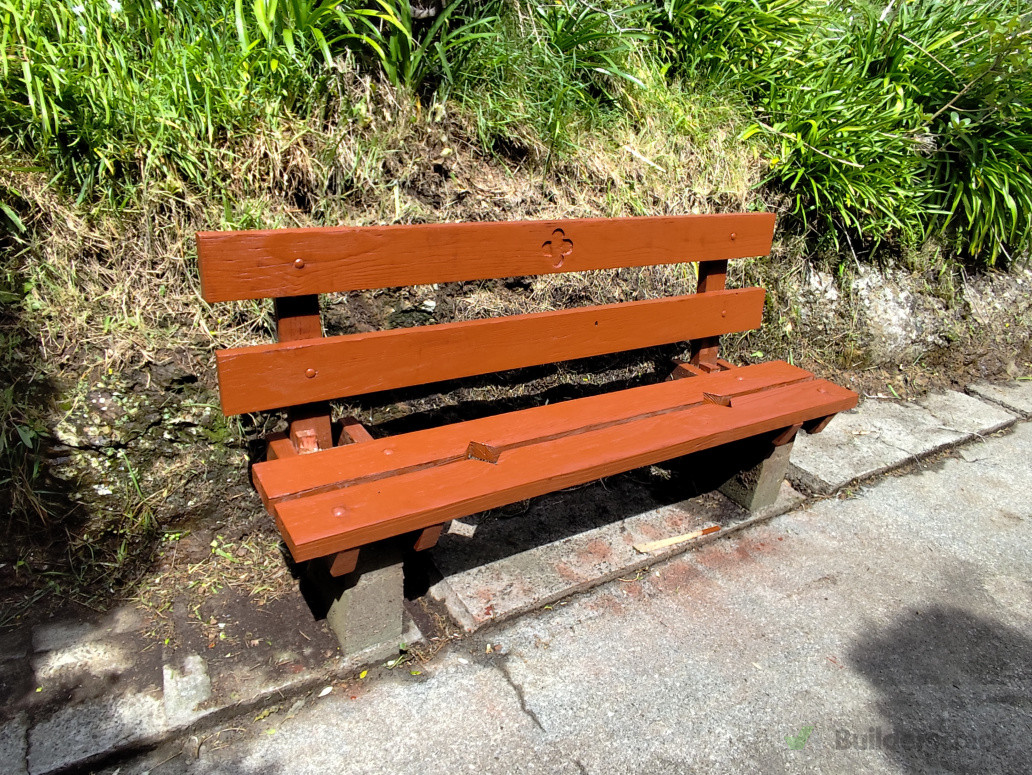 Fixin and painting  garden bench.