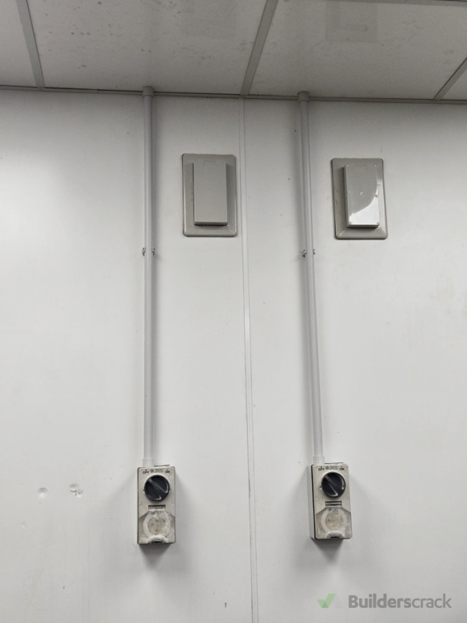 Relocated 3 phase plugs in a supermarket.