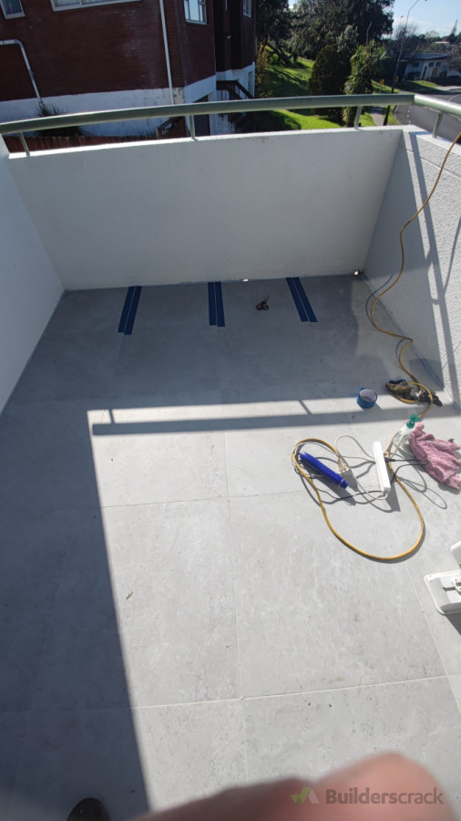 Balcony Leak Repair with Clear Membrane over Tiles