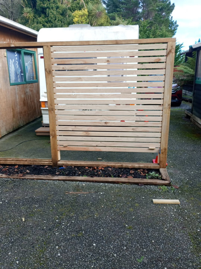 Fence restoration, power washed & replaced trellis