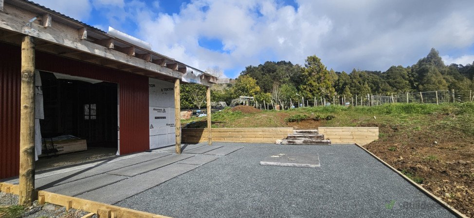 Fire pit, full native gardens, decorative pebble. So much more to come