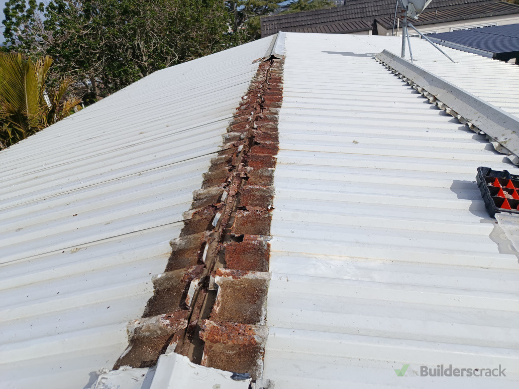 Extensive Rust Present Under Ridge Flashing