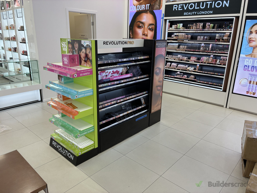 Installation of floor display & wall unit. Farmers nationwide