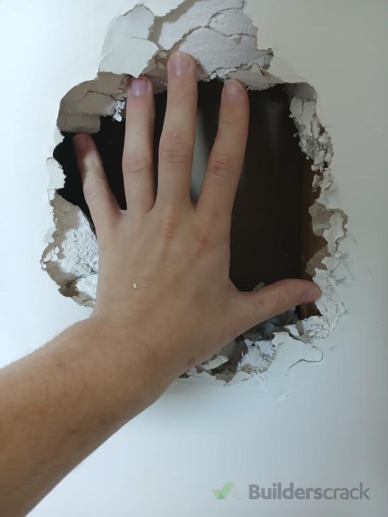 Repair two holes in the drywall (#1187890) | Builderscrack
