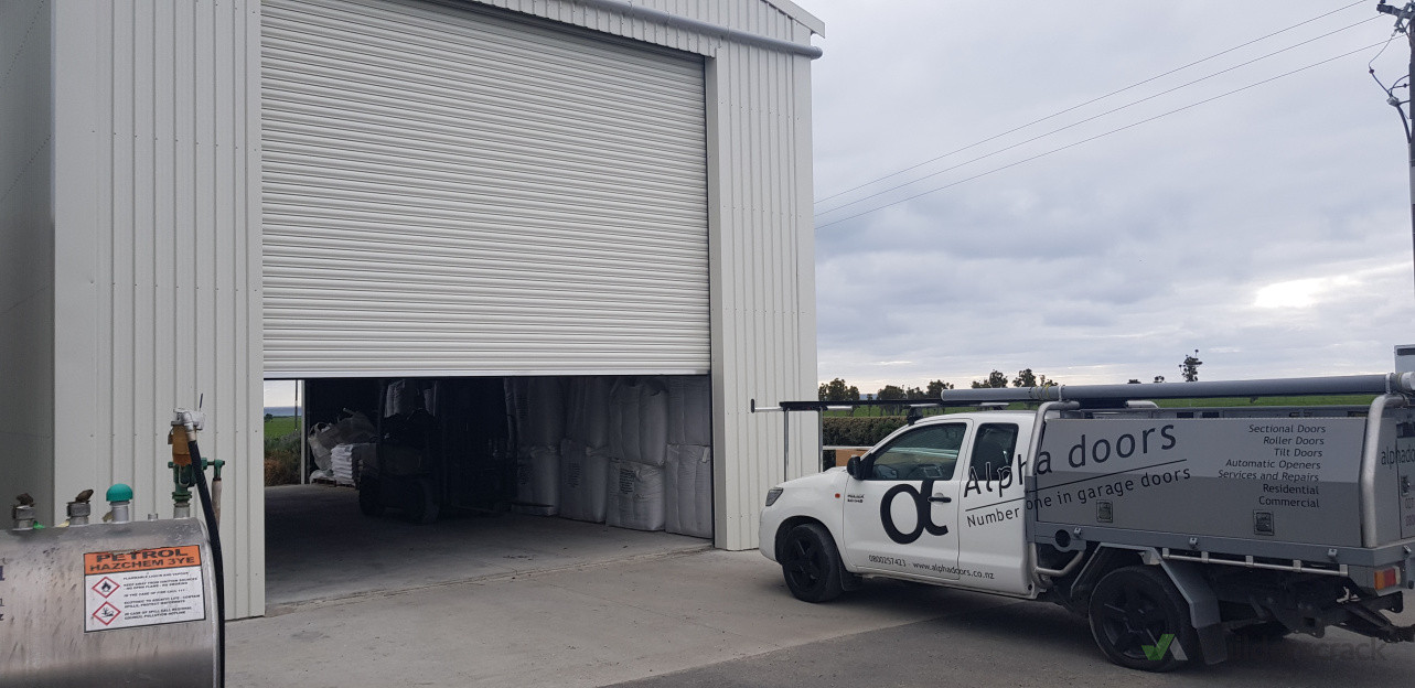 Roller Shutter door powdercoated in Titania with ECR600 auto opener