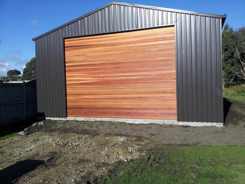 Cedar Sectional door sealed with 'CD50 Clear' with auto opener